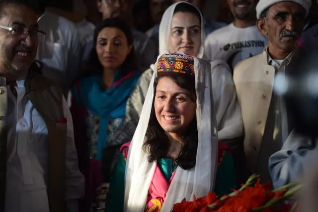 samina baig the first pakistani woman climber to summit the world 039 s highest peak mount everest smiles on her arrival at benazir airport in islamabad on june 3 2013 photo afp samina baig the first pakistani woman climber to summit the world 039 s highest peak mount everest smiles on her arrival at benazir airport in islamabad on june 3 2013 photo afp