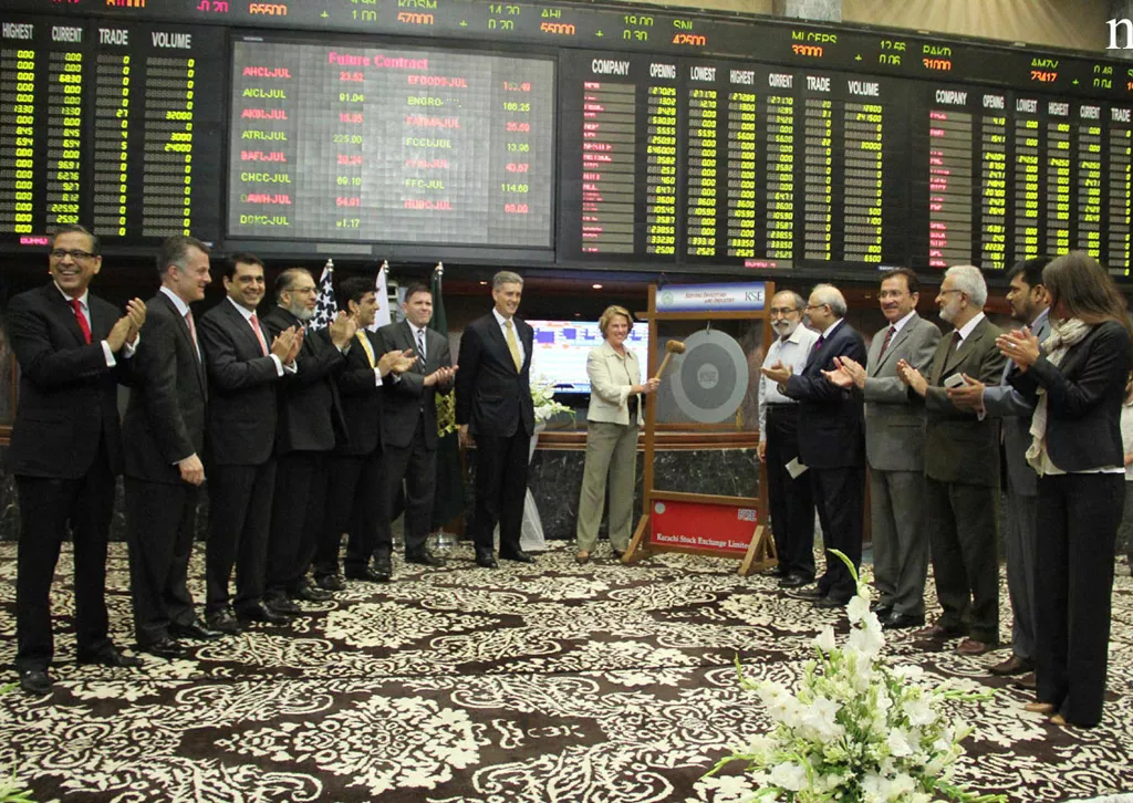 overseas private investment corporation opic ceo elizabeth l littlefield rings the kse bell on her visit to karachi stock exchange kse photo nni overseas private investment corporation opic ceo elizabeth l littlefield rings the kse bell on her visit to karachi stock exchange kse photo nni