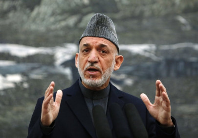 afghan endgame karzai sees us pakistan collusion