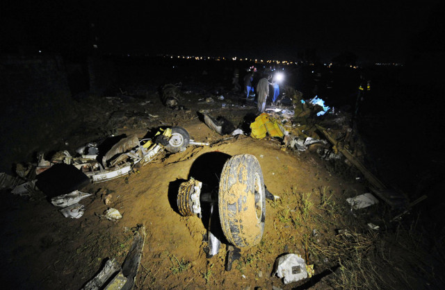 a plane wheel c lies amongst debris at the scene of a plane crash as pakistani rescue workers search for victims in the outskirts of islamabad on april 20 2012 photo afp file a plane wheel c lies amongst debris at the scene of a plane crash as pakistani rescue workers search for victims in the outskirts of islamabad on april 20 2012 photo afp file