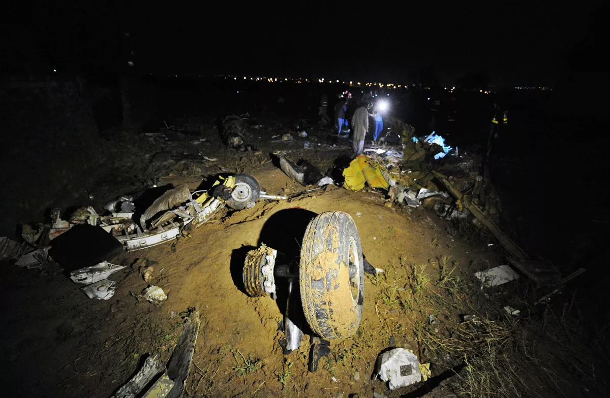 a plane wheel c lies amongst debris at the scene of a plane crash as pakistani rescue workers search for victims in the outskirts of islamabad on april 20 2012 photo afp file a plane wheel c lies amongst debris at the scene of a plane crash as pakistani rescue workers search for victims in the outskirts of islamabad on april 20 2012 photo afp file