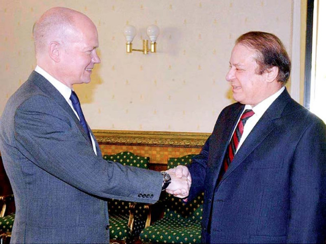 prime minister nawaz sharif and british foreign secretory william hague exchange pleasantries during their meeting at the prime minister s office photo app prime minister nawaz sharif and british foreign secretory william hague exchange pleasantries during their meeting at the prime minister s office photo app