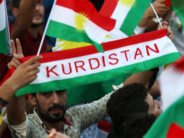 iraqi kurds fly their national flag prior to the upcoming independence referendum in irbil capital of the autonomous kurdish region of northern iraq on sept 16 2017 photo afp