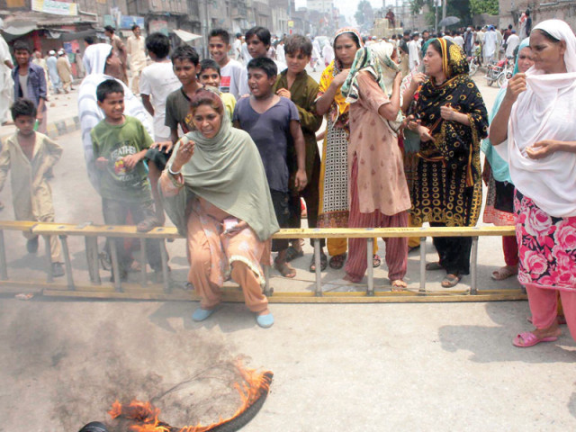 residents of kohati chowk burn tyres at a protest against load shedding earlier the pakistan tehreek e insaf led government had said it would launch protests against the centre if power cuts were not reduced photo inp