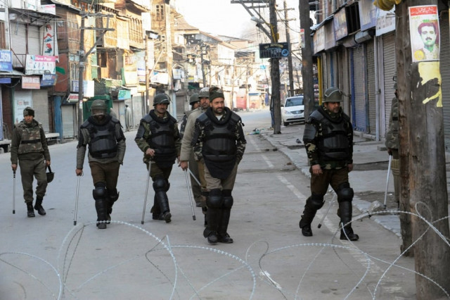 indian police patrol on a street in srinagar on february 10 2013 photo afp indian police patrol on a street in srinagar on february 10 2013 photo afp