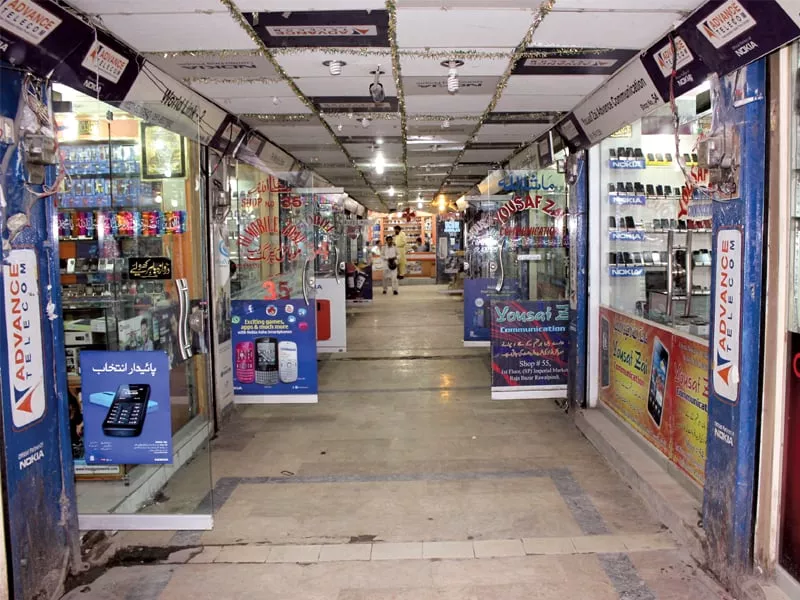 first floor of imperial market is now completely occupied by wholesale mobile phone shops it used to be a hotel some years ago photo waqas naeem express first floor of imperial market is now completely occupied by wholesale mobile phone shops it used to be a hotel some years ago photo waqas naeem express