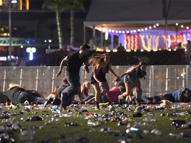 people run from the route 91 harvest country music festival in las vegas nevada after a gunman opened fire photo afp