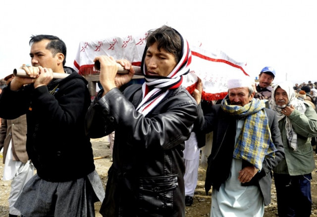 pakistani shia muslims carry the coffins of relatives during a mass burial ceremony in quetta on february 20 2013 photo afp file pakistani shia muslims carry the coffins of relatives during a mass burial ceremony in quetta on february 20 2013 photo afp file