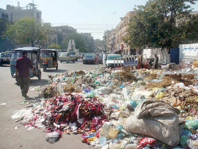 heaps of garbage across the city are a common sight these days as kmc workers fail to get their salaries the court has ordered the government to pay its grant to the municipality so workers can be paid before eid photo file