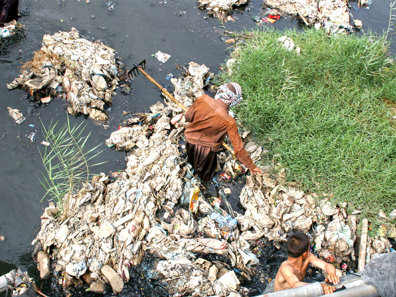 on paper sewage is carried from a house to the lane from where a collection channel takes it to the sewerage treatment plant in reality most of the toilet waste just finds its way into the storm water drains photo athar khan express file