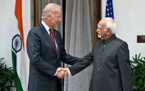 biden met his counterpart hamid ansari at the start of a round of talks photo afp biden met his counterpart hamid ansari at the start of a round of talks photo afp