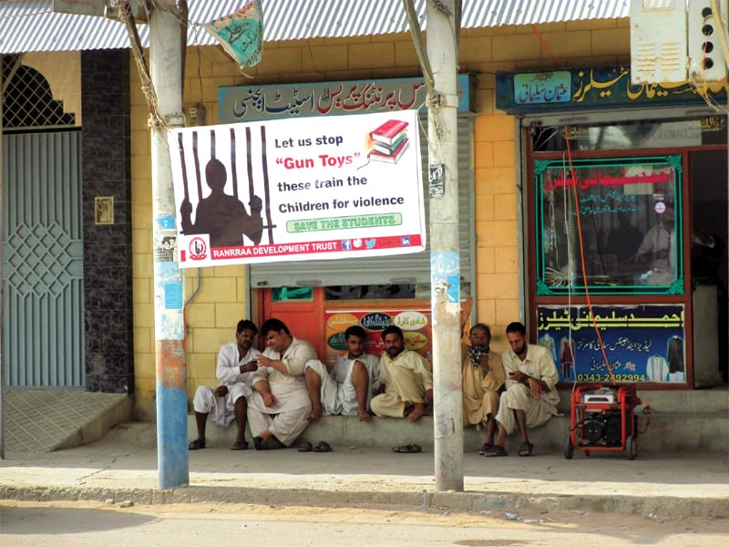 ngo ranrraa is working primarily in pashtun majority neighbourhoods to create awareness on the adverse effects of letting children play with toy guns they have put up banners across the neighbourhood so parents do not buy guns for their children who insist on buying them for eid photo athar khan express amp ranrraa