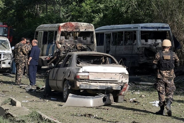 afghan security personnel arrive at the site of a suicide attack in kabul on june 11 2013 photo afp