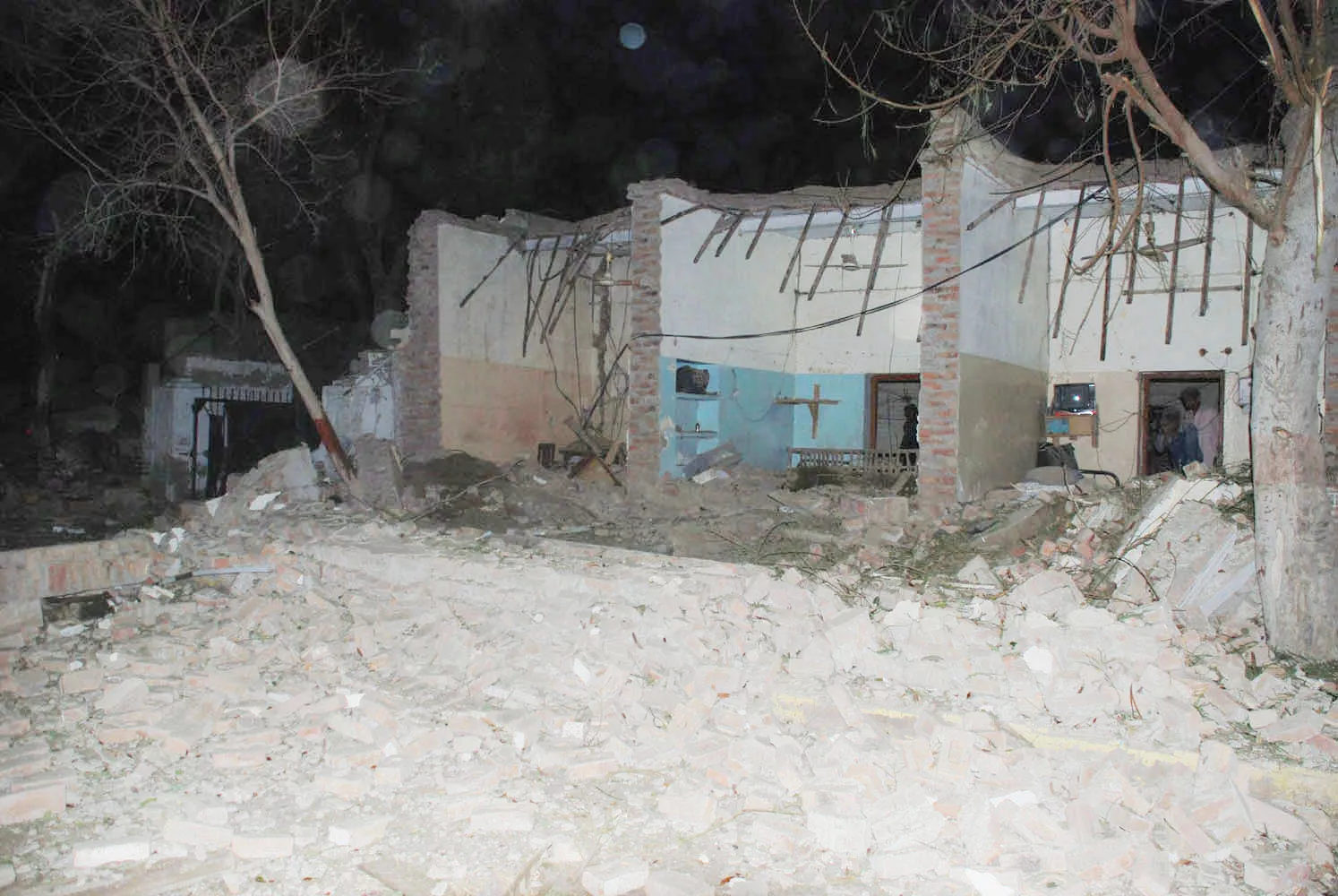 the first blast occurred when militants reportedly rammed an explosive laden truck into one of the houses photo express naeem ahmed ghouri the first blast occurred when militants reportedly rammed an explosive laden truck into one of the houses photo express naeem ahmed ghouri