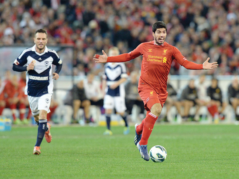 despite constant speculation linking suarez to an exit liverpool manager rodgers has insisted the striker remains a part of their plans this season photo afp