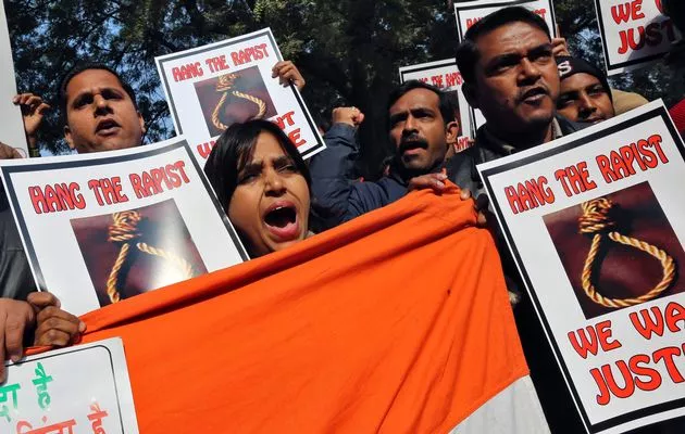 people shout slogans and hold placards during a protest against rape in new delhi photo reuters people shout slogans and hold placards during a protest against rape in new delhi photo reuters