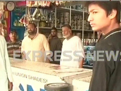 shop attacked in karachi for non payment of extortion money