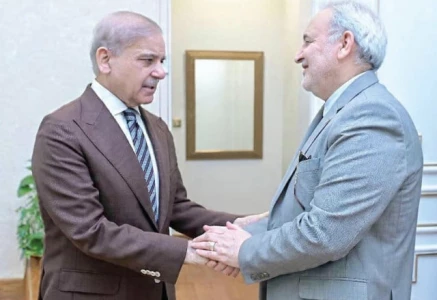 prime minister shehbaz sharif shakes hands with iran ambassador to pakistan dr reza amiri moghadam during a meeting in islamabad photo online