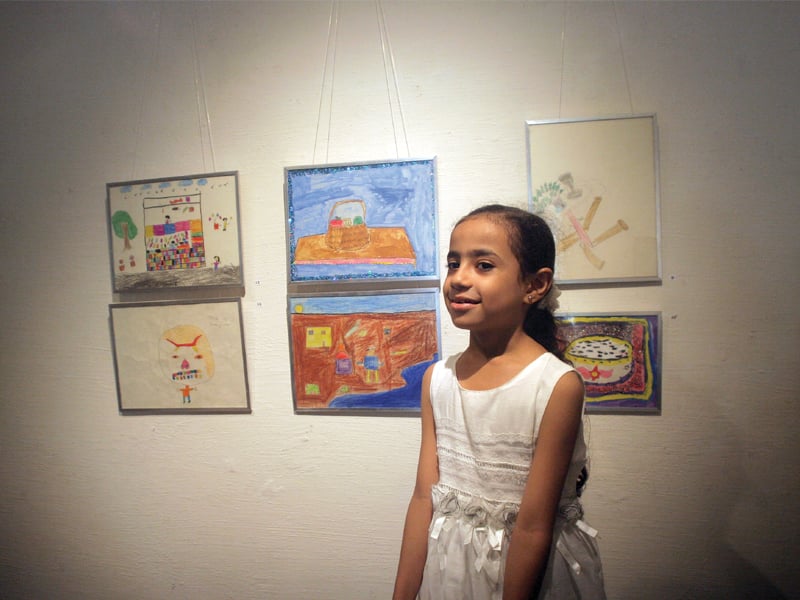 about 21 children of kiran school between four and twelve years and their mothers display their art works at koel gallery photo athar khan express