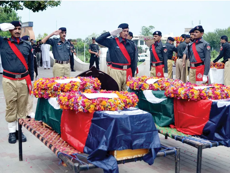 funeral prayers for the slain bodyguard and driver of the frontier reserve police deputy commandant were held at police lines on thursday photo inp funeral prayers for the slain bodyguard and driver of the frontier reserve police deputy commandant were held at police lines on thursday photo inp