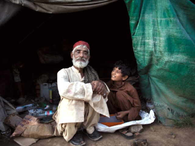 the father and son reside in a slum located across a lavish new wedding hall photo myra iqbal express the father and son reside in a slum located across a lavish new wedding hall photo myra iqbal express