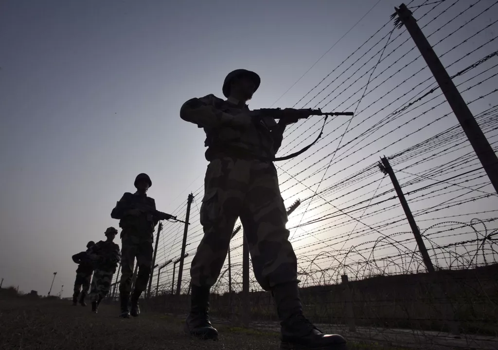 indian border security force bsf soldiers patrol the fenced border with pakistan in suchetgarh southwest of jammu january 16 2013 photo reuters file indian border security force bsf soldiers patrol the fenced border with pakistan in suchetgarh southwest of jammu january 16 2013 photo reuters file