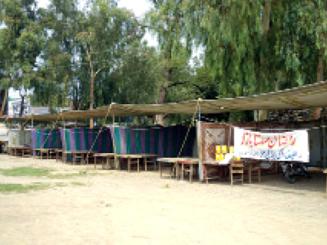 the bazaar was set up at the fef ground with more than two dozen stalls selling ghee cooking oil rice flour and basin among other items photo express the bazaar was set up at the fef ground with more than two dozen stalls selling ghee cooking oil rice flour and basin among other items photo express