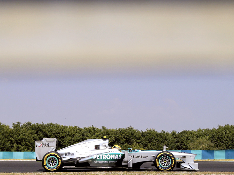 lewis hamilton bagged his third consecutive pole and fourth of the season with a best lap of one minute 19 388 seconds ahead of the hungarian grand prix photo afp