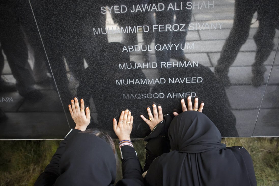 family members of the victims of airblue plane crash mourn photo afp file