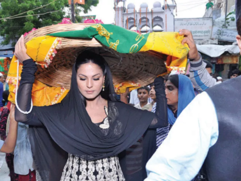 veena first revealed her religious side to the world through her television show astaghfaar last year photo file veena first revealed her religious side to the world through her television show astaghfaar last year photo file