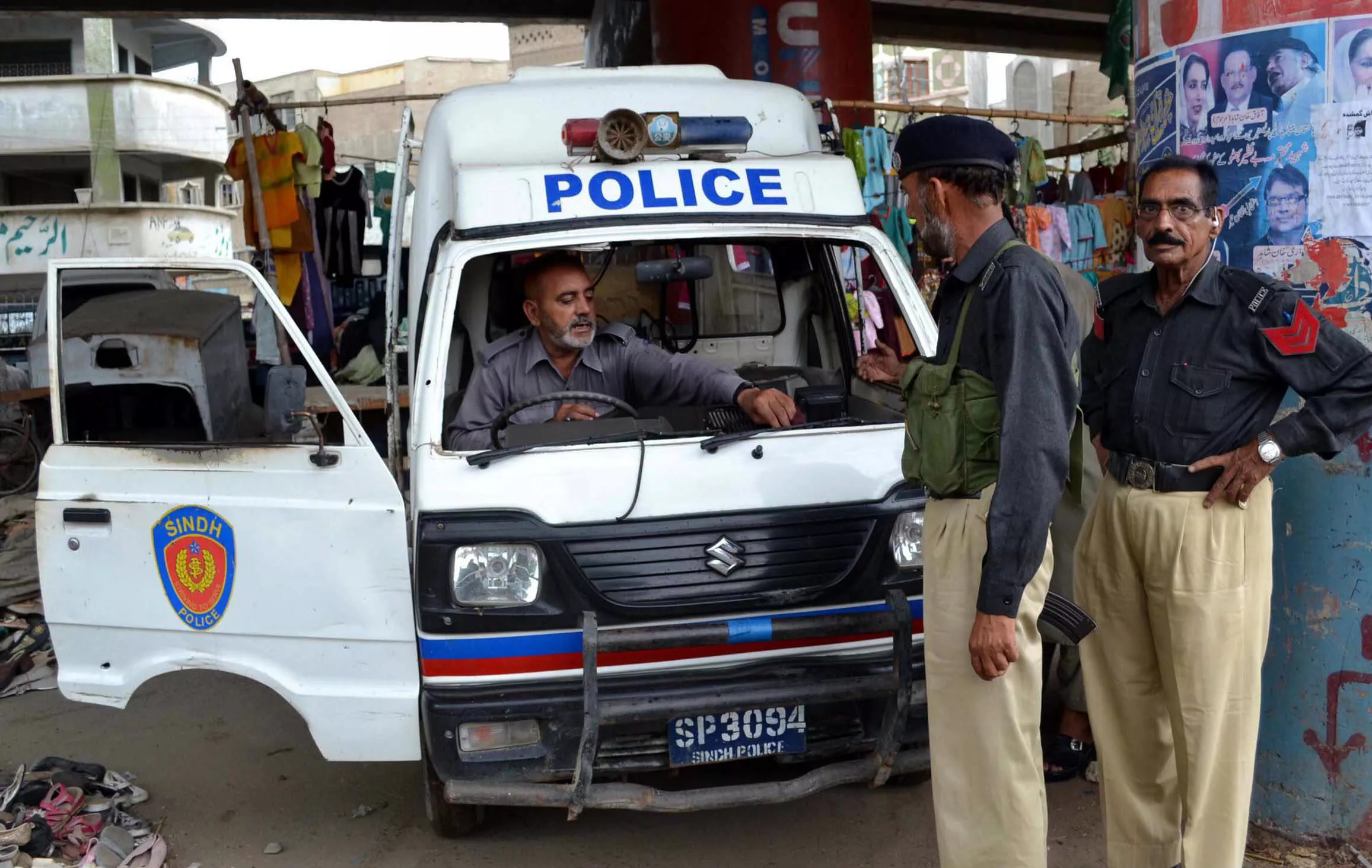 police officials inspect a police van which came under a grenade attack near pirabad photo rashid ajmeri express police officials inspect a police van which came under a grenade attack near pirabad photo rashid ajmeri express