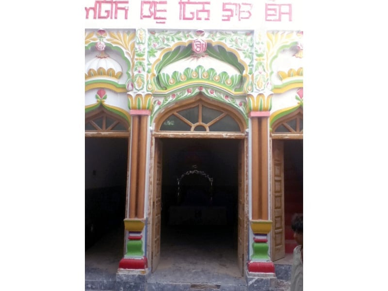 a front view of an under construction gurudwara whose roof was destroyed in the 2006 operation photo express