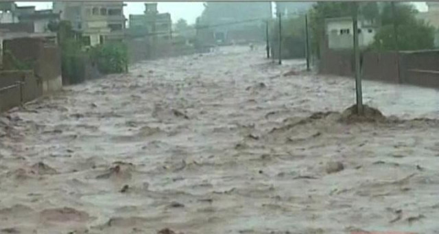a screengrab shows the flooded street in chitral screengrab express news a screengrab shows the flooded street in chitral screengrab express news