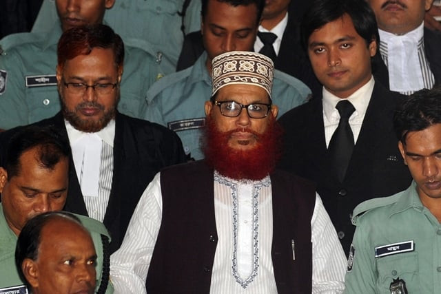 in this photograph taken on august 18 2011 ji leader delwar hossain sayedee c emerges from the bangladesh international crimes tribunal in dhaka photo afp in this photograph taken on august 18 2011 ji leader delwar hossain sayedee c emerges from the bangladesh international crimes tribunal in dhaka photo afp