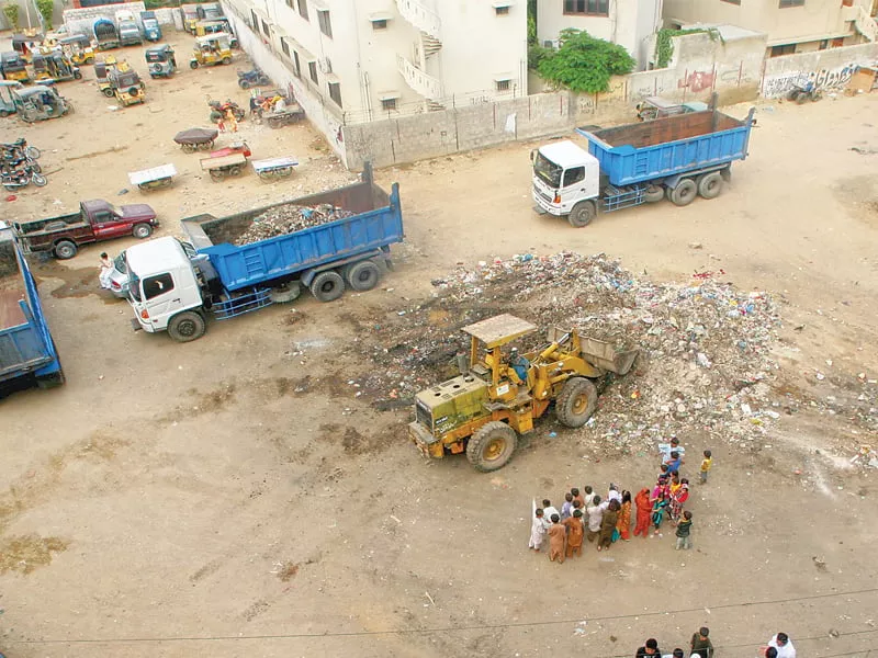 a youth initiative go green approached karachi commissioner and helped initiate a clean up of shah rasul colony in dha the huge piles of garbage were picked up on friday afternoon photo athar khan express a youth initiative go green approached karachi commissioner and helped initiate a clean up of shah rasul colony in dha the huge piles of garbage were picked up on friday afternoon photo athar khan express