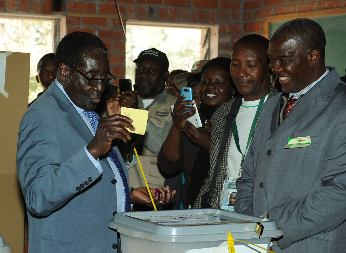 zimbabwe president robert mugabe casts his vote in the presidential elections mugabe was re elected as president photo afp