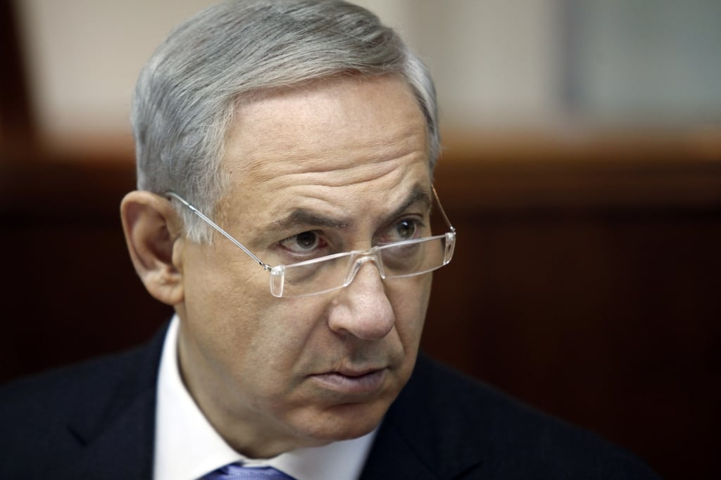 israeli prime minister benjamin netanyahu opens the weekly cabinet meeting at his jerusalem office on august 4 2013 photo afp