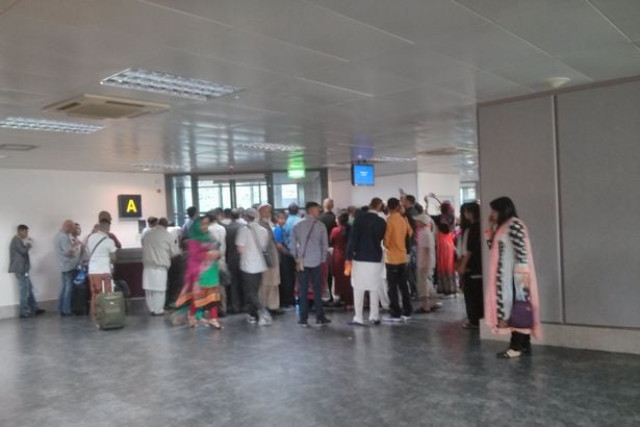 passengers waiting for the plane photo manchestereveningnews co uk passengers waiting for the plane photo manchestereveningnews co uk