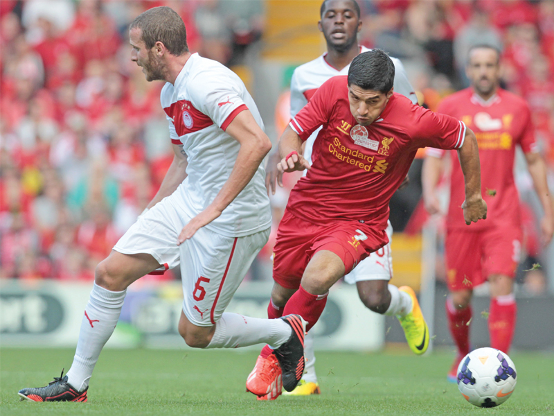 liverpool manager rodgers insisted it would take a gareth bale sized bid near 100 million to persuade them into selling controversial striker suarez photo afp