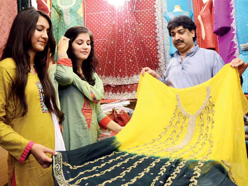 girls check out embroidered dresses at moti bazar as eid shopping catches momentum photo online girls check out embroidered dresses at moti bazar as eid shopping catches momentum photo online