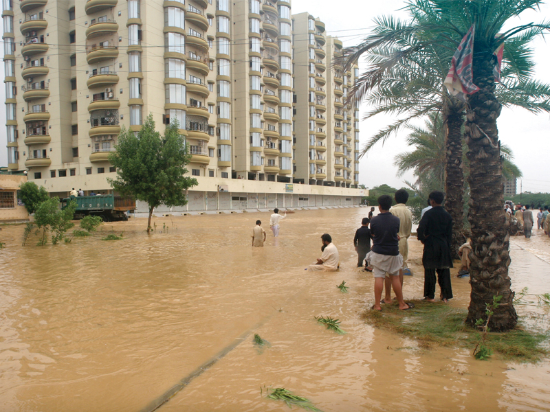 clockwise all the water that flooded through saadi town gathered at safoora goth from where it went further down as water level in malir river rose parts of the ebm flyover were swept by the flood the road outside gulistan e jauhar police station was flooded blocking access to the station residents of rustam zikri goth on pehlwan road places concrete blocks on the road and filled the gaps with cloth to prevent water from flooding their houses photos athar khan express the navy used eight speed boats to rescue stranded people in slums surrounding saadi town photo rashid ajmeri express