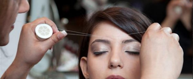 threading is a common way to shape eyebrows photo afp threading is a common way to shape eyebrows photo afp