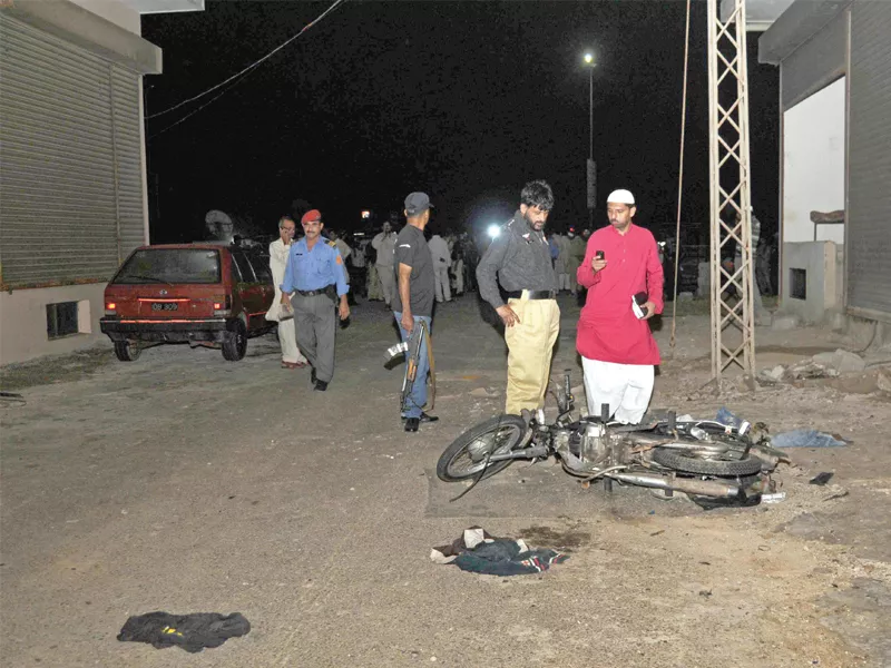 the closed wine shop on khayaban e muslim in dha was the first one to be attacked on tuesday photo express the closed wine shop on khayaban e muslim in dha was the first one to be attacked on tuesday photo express