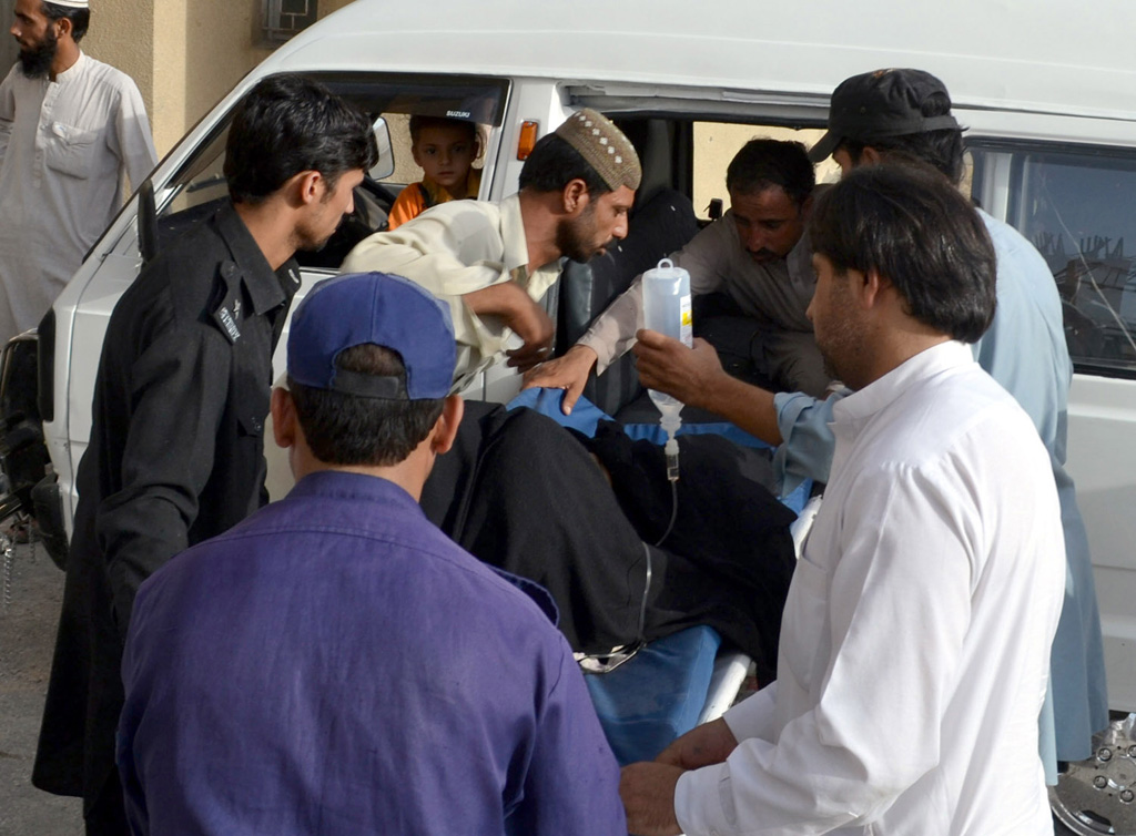people shifting the injured of the mastung blast to hospital photo naseem james