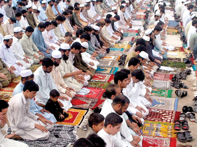 afghan citizens offer eid prayers at the kacha garhee refugee camp photo online