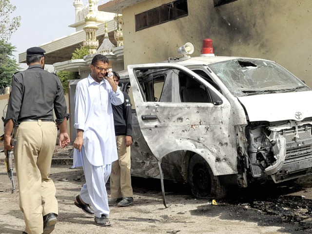 police officials at the site of a suicide bomb attack in quetta that killed many police officers and wounded dozens more photo afp police officials at the site of a suicide bomb attack in quetta that killed many police officers and wounded dozens more photo afp