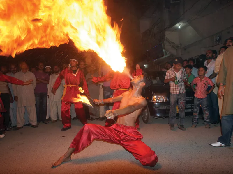 these file photos shows the ibrahim dada group from lyari performing the fire dance liwa outside the t2f groups such as this one date as far back as the 1970s and have become part of the popular culture in lyari since these file photos shows the ibrahim dada group from lyari performing the fire dance liwa outside the t2f groups such as this one date as far back as the 1970s and have become part of the popular culture in lyari since