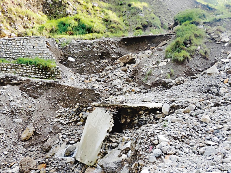 a view of the chanala noorbang road in abbottabad which was damaged after the recent spell of rains and subsequent landslides photo nni