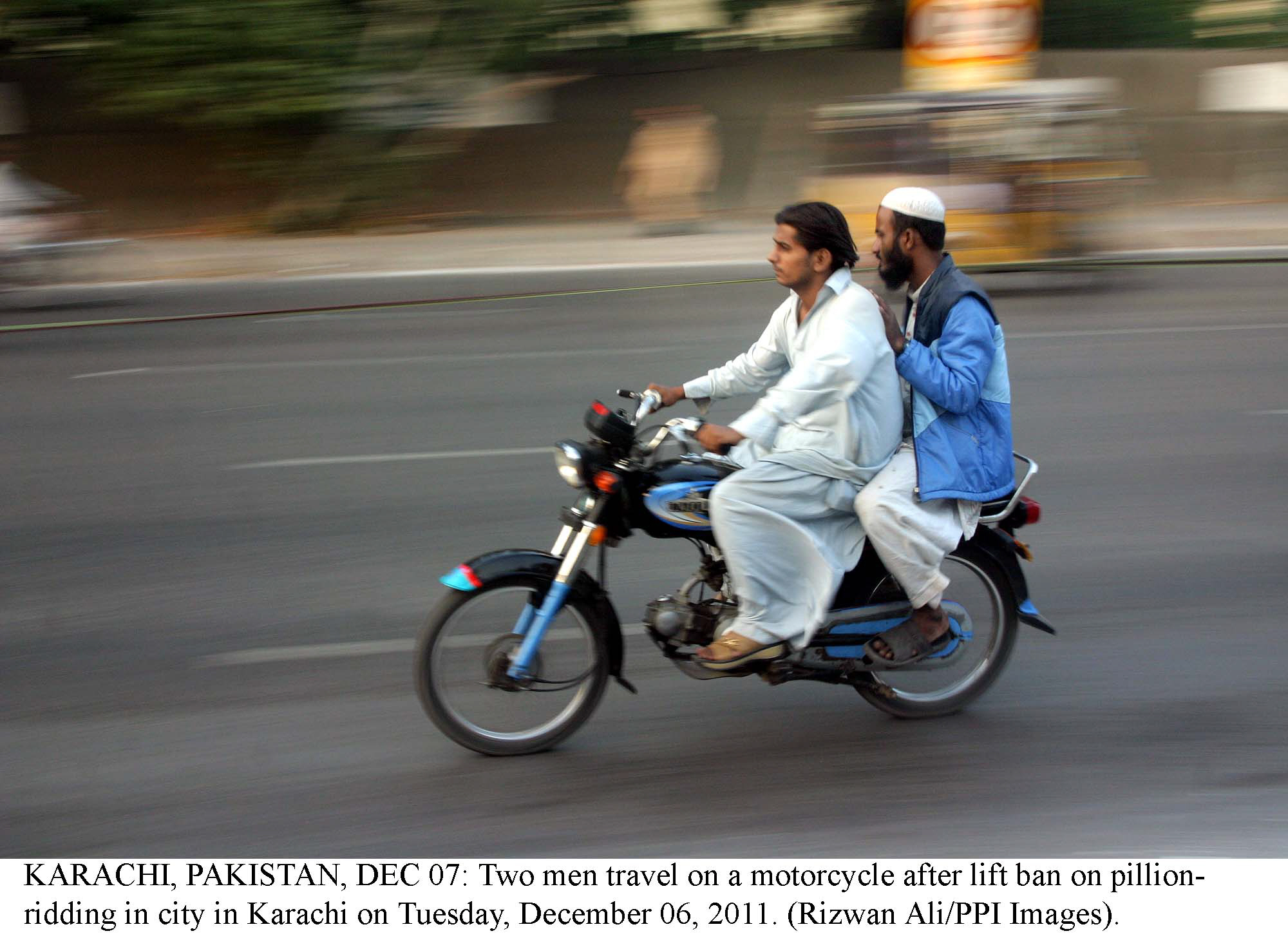 ban on pillion riding lifted by sindh government photo ppi file