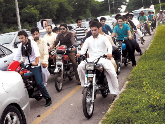a long queue of cars bikes and public transport along murree road on sunday photo myra iqbal express
